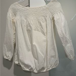 Luxury European brand blouse. Very cute and pretty. Can wear off shoulder